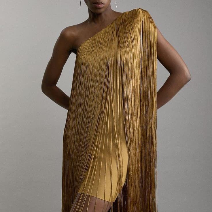 Product image: Sleek And Playful Tassel Skirt Party Dress